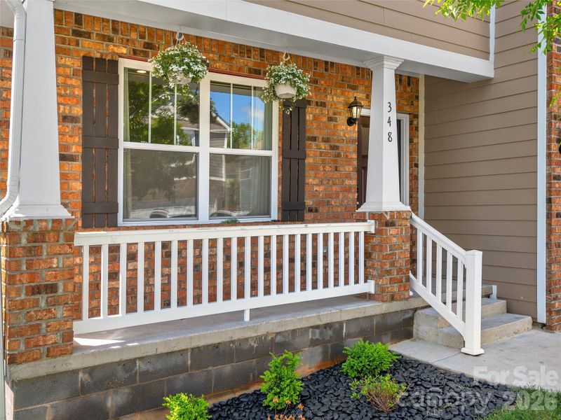 Exterior details and patio area of a home in , Candler (Image 4).