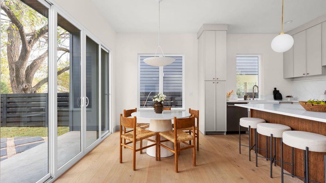 Dining area featuring light wood-style flooring