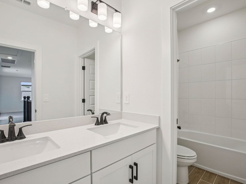 Furnished interior view inside a new home in Magnolia Bay - Reserve Series, Nokomis (Image 8).