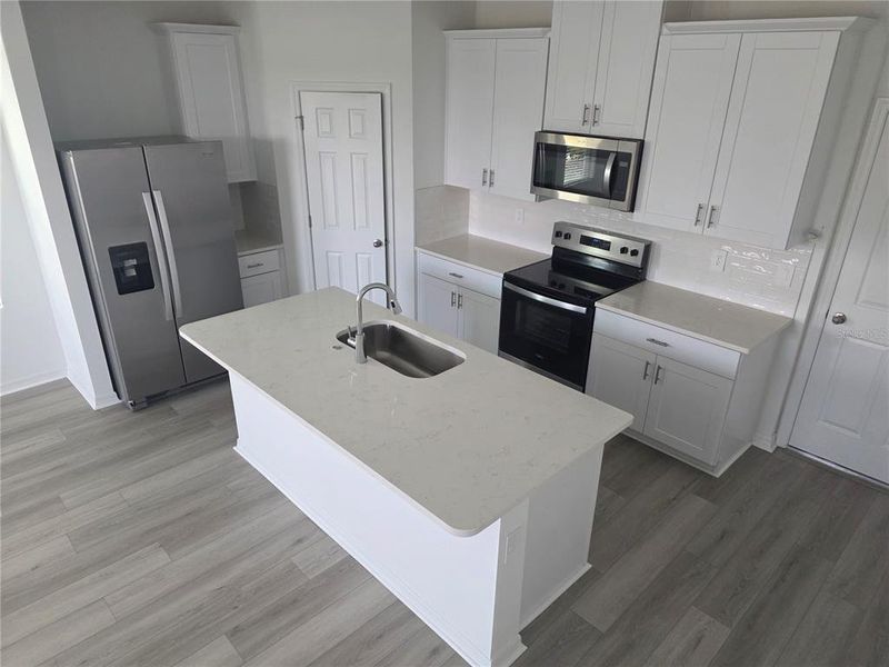 Furnished interior view inside a new home in The Meadow at Crossprairie Bungalows, St. Cloud (Image 9).