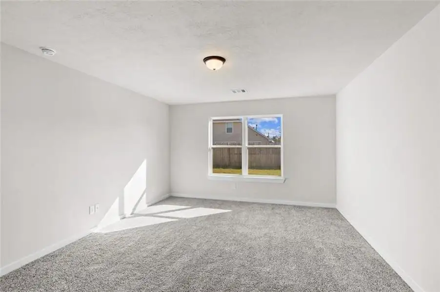 Spacious, unfurnished interior of a new home in Ladera Creek, Conroe (Image 7).