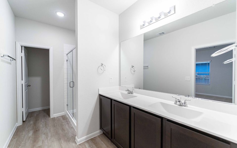 Furnished interior view inside a new home in Brooklands, Hutto (Image 6).