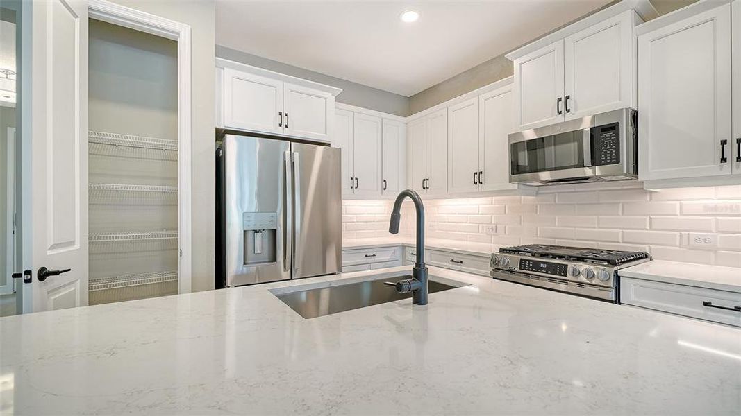 Furnished interior view inside a new home in Windward, Lakewood Ranch (Image 9).