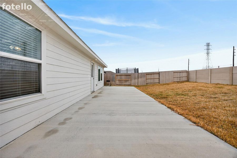 Exterior details and patio area of a home in Anniston, Katy (Image 24).