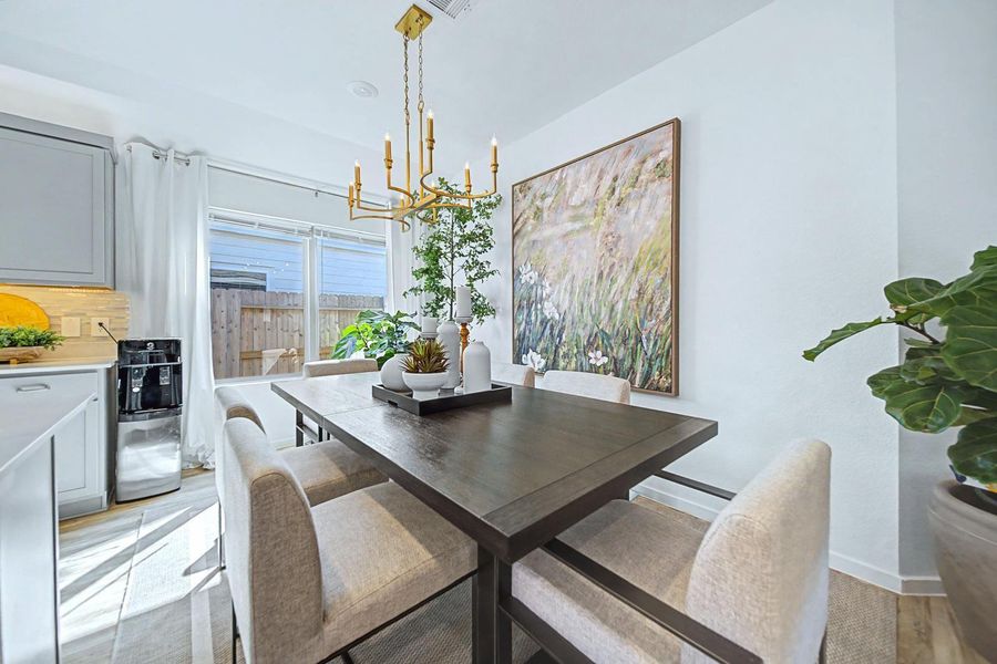 Furnished interior view inside a new home in Pinewood at Grand Texas, New Caney (Image 10).