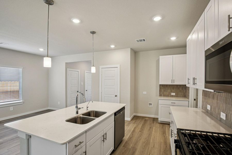 Photo is not of the actual home, but is an inspirational photo of builder’s model home and may depict options, furnishings, and/or decorator features that are not included