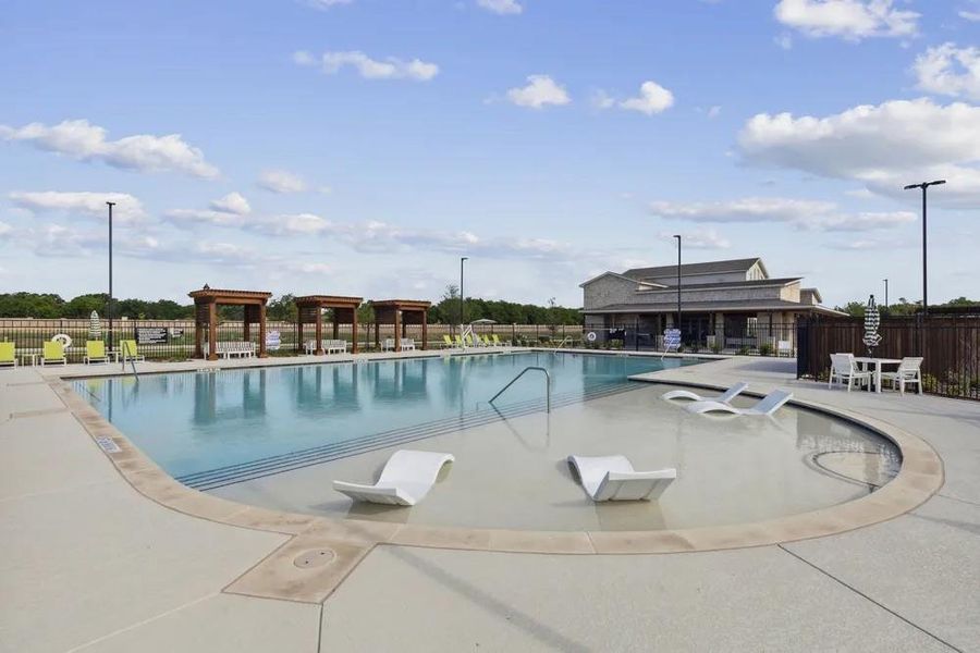 Community pool featuring a patio area