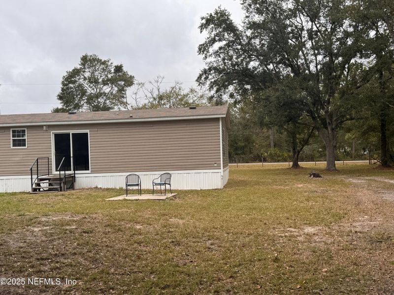 Exterior details and patio area of a home in , Fernandina Beach (Image 17).