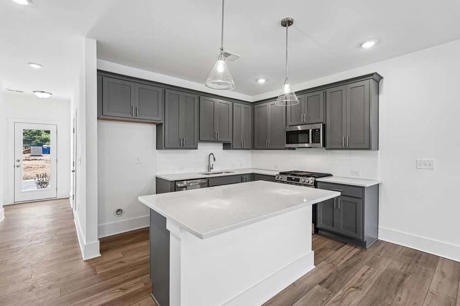 Kitchen featuring Minimalist Collection Finishes Kitchen featuring Minimalist Collection Finishes