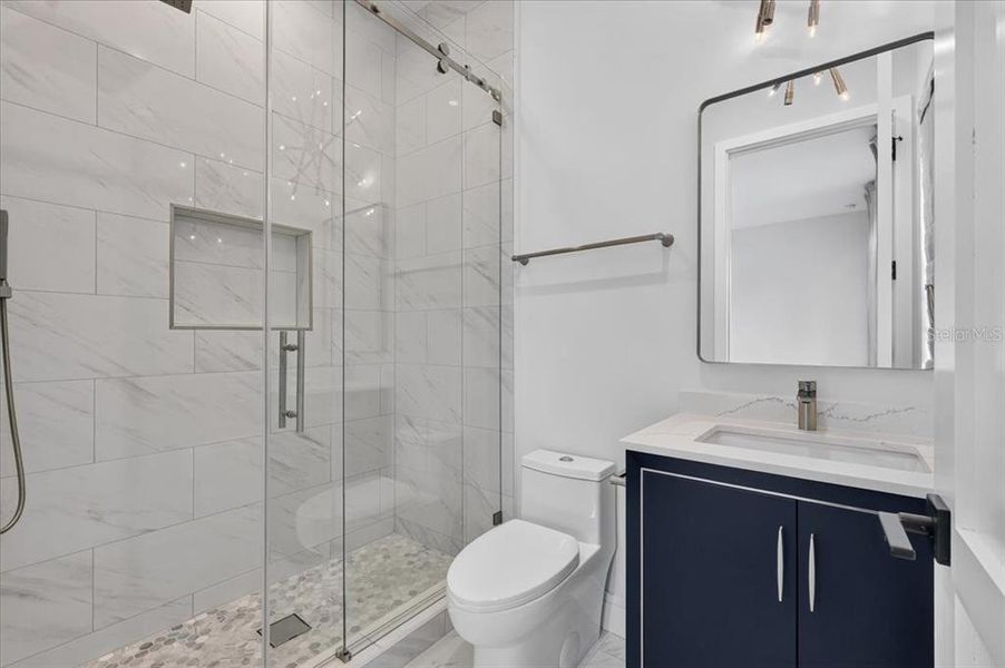 Furnished interior view inside a new home in , Redington Shores (Image 15).