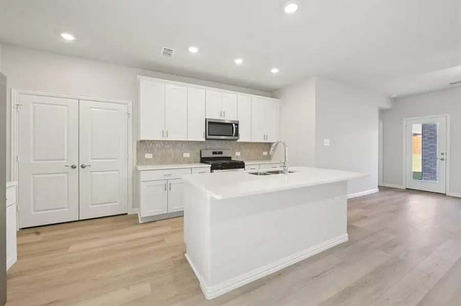 Photo is not of the actual home, but is an inspirational photo of builder’s model home and may depict options, furnishings, and/or decorator features that are not included.