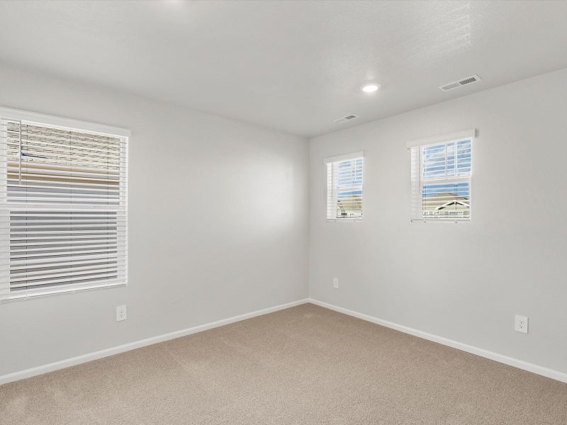 Spacious, unfurnished interior of a new home in Lorson Ranch: The Trail Collection, Colorado Springs (Image 13).