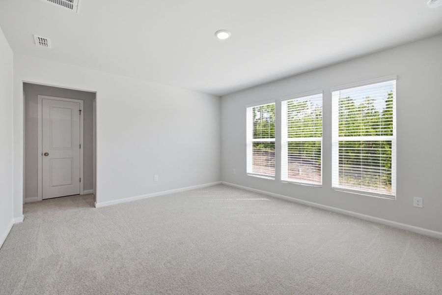 Spacious, unfurnished interior of a new home in Carpenter Falls, Durham (Image 13).
