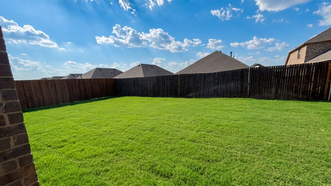Exterior details and patio area of a home in Lakewood Trails, Forney (Image 15).