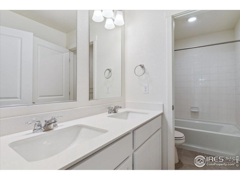 Furnished interior view inside a new home in Silver Peaks, Lochbuie (Image 8).