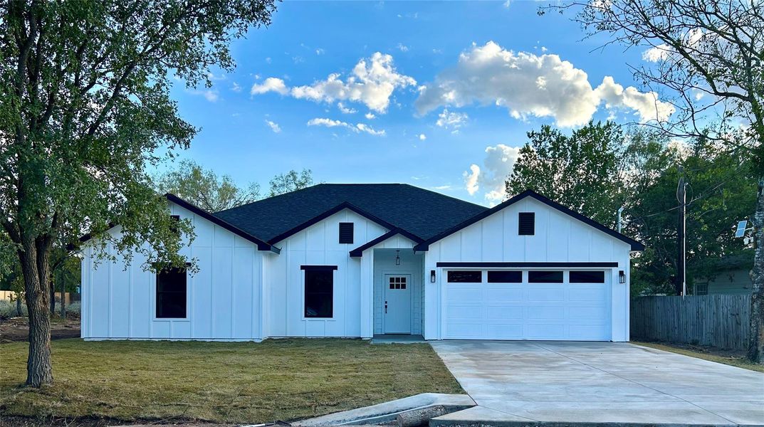 Front exterior of a new home in , Bastrop, TX, highlighting curb appeal (Image 1). Front exterior of a new home in , Bastrop, TX, highlighting curb appeal (Image 1).