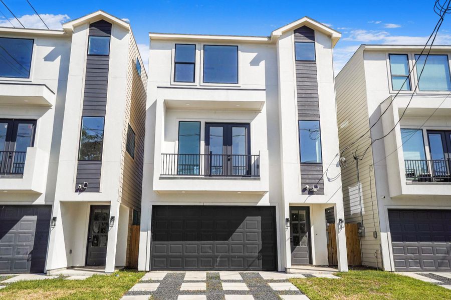 Front exterior of a new home in , Houston, TX, highlighting curb appeal (Image 20).
