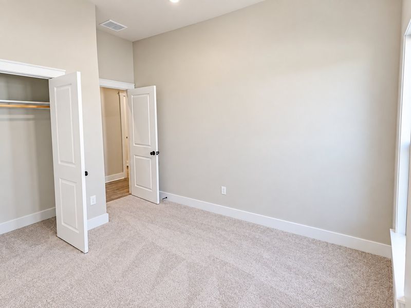 DSLD HOMES NEW CONSTRUCTION MOVE IN READY HOME IN LONGLEAF COMMUNITY LOCATED IN LUMBERTON, TX - Guest bedroom