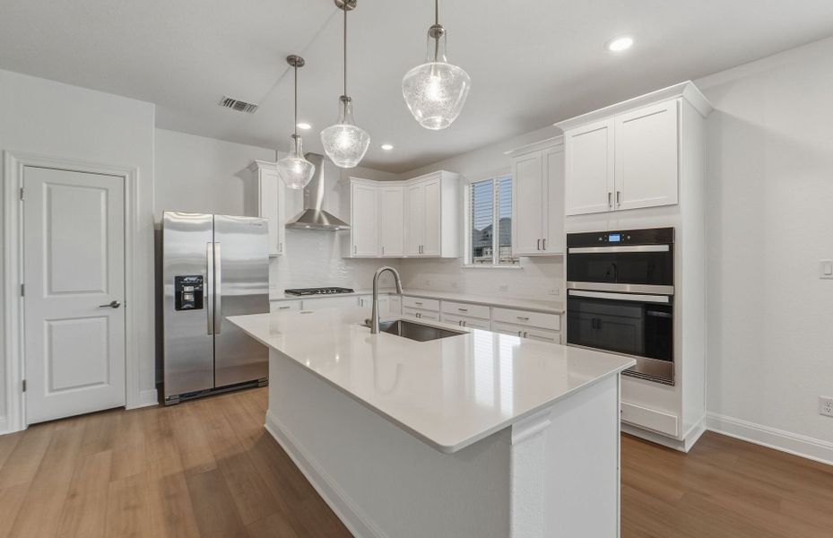 Furnished interior view inside a new home in Saddleback at Santa Rita Ranch, Liberty Hill (Image 8). Furnished interior view inside a new home in Saddleback at Santa Rita Ranch, Liberty Hill (Image 8).