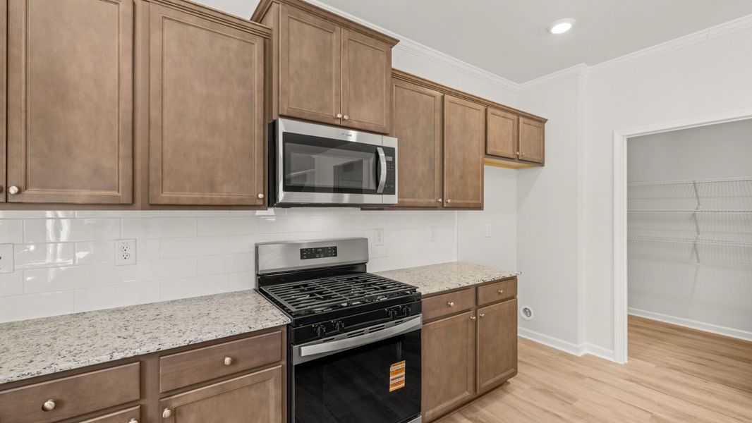 Representative furnished interior of a home built from the Hanover by D.R. Horton in Northwoods at Mirror Lake, Villa Rica (Image 11).