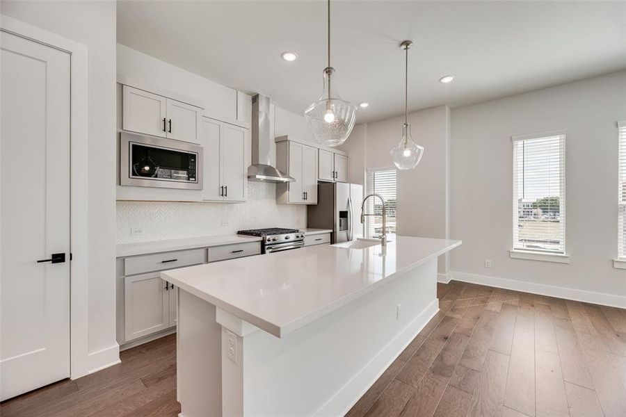 Furnished interior view inside a new home in Collin Creek, Plano (Image 6).