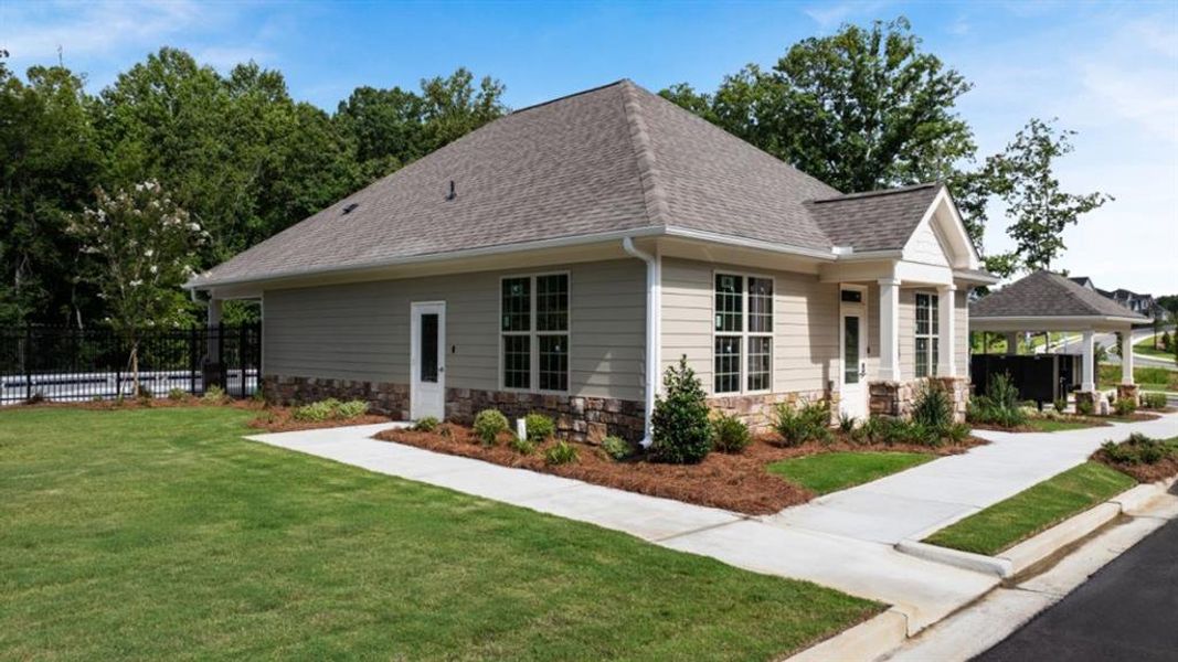 Front exterior of a new home in Butner Estates, South Fulton, GA, highlighting curb appeal (Image 2). Front exterior of a new home in Butner Estates, South Fulton, GA, highlighting curb appeal (Image 2).