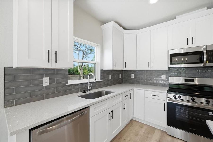 Furnished interior view inside a new home in , Weeki Wachee (Image 7).