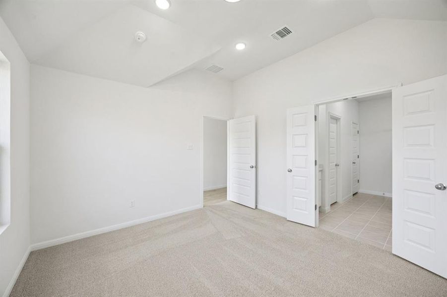 Primary Suite in the Cypress home plan by Trophy Signature Homes - REPRESENTATIVE PHOTO