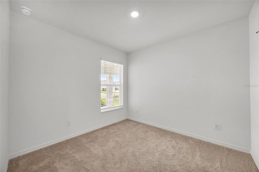 Spacious, unfurnished interior of a new home in Gum Lake Preserve, Lake Alfred (Image 22).