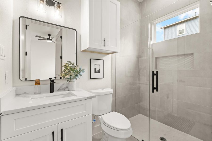 Downstairs full bath — walk-in shower only, no tub/combo, designed for accessible living Downstairs full bath — walk-in shower only, no tub/combo, designed for accessible living