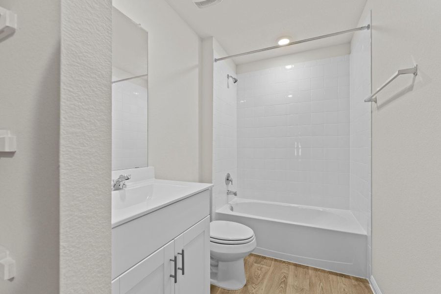 Furnished interior view inside a new home in Whisper South, San Marcos (Image 11).