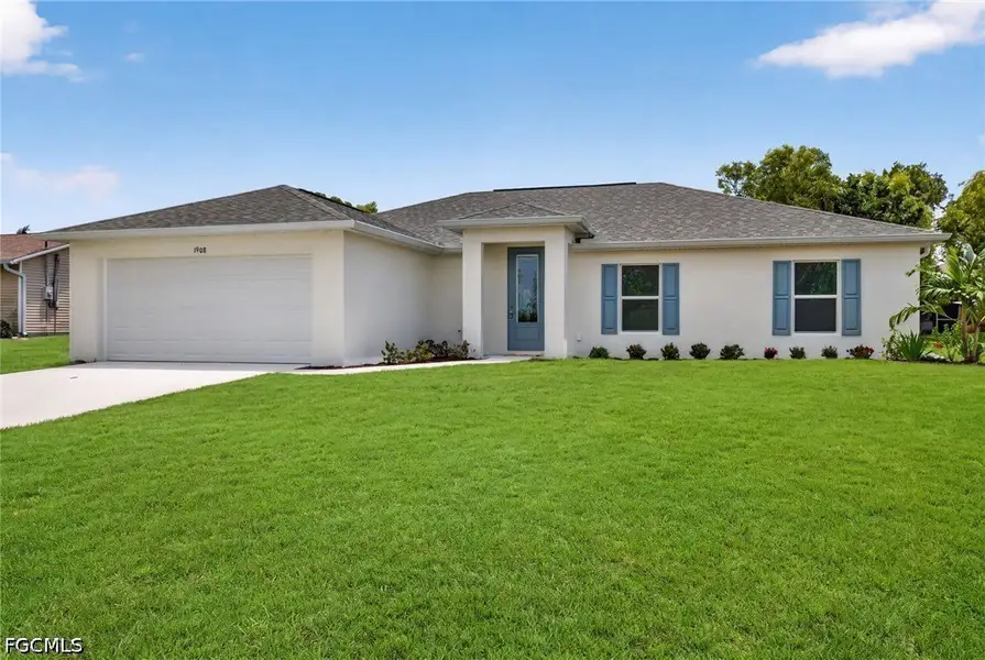 Front exterior of a new home in Cape Coral, Cape Coral, FL, highlighting curb appeal (Image 2). Front exterior of a new home in Cape Coral, Cape Coral, FL, highlighting curb appeal (Image 2).