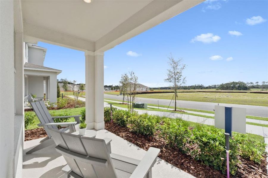 Exterior details and patio area of a home in Crossroads at Kelly Park, Apopka (Image 21).