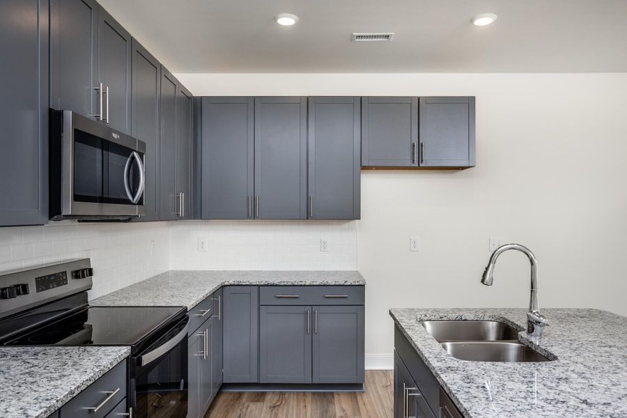 Furnished interior view inside a new home in 1158 Place Townhomes, Wilson (Image 7).