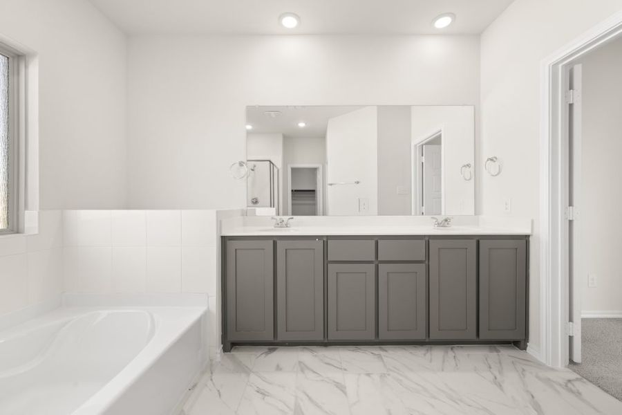 Front exterior of a new home in Myrtle Creek, Waxahachie, TX, highlighting curb appeal (Image 20). Front exterior of a new home in Myrtle Creek, Waxahachie, TX, highlighting curb appeal (Image 20).