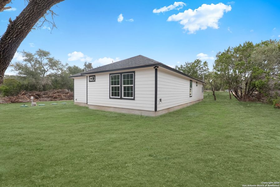 Exterior details and patio area of a home in , Spring Branch (Image 27).