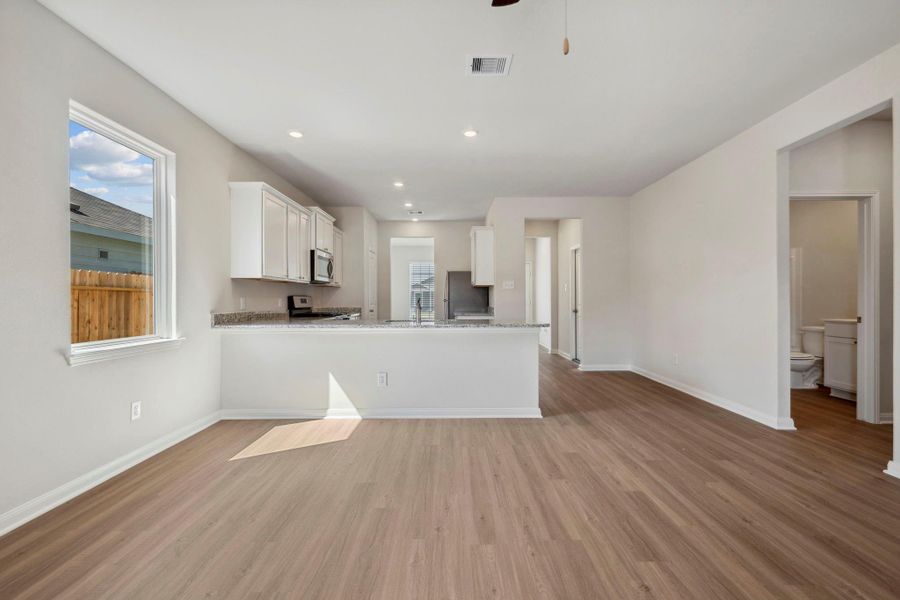 Furnished interior in a model home at Trails at Cochran Ranch in Waller (Image 10).