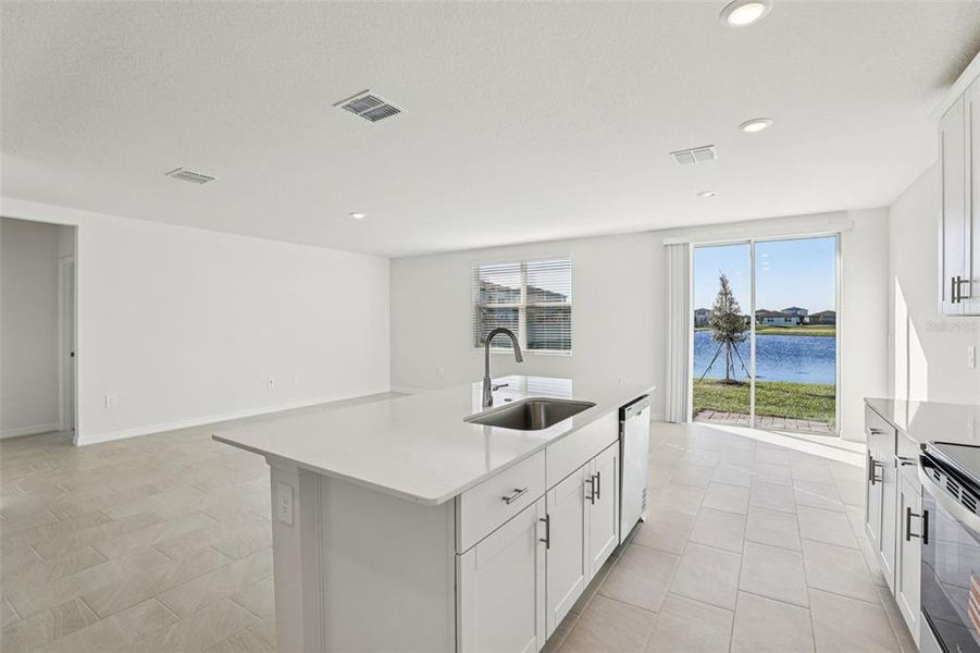 Furnished interior view inside a new home in Lake Deer Estates - Signature Series, Poinciana (Image 14).