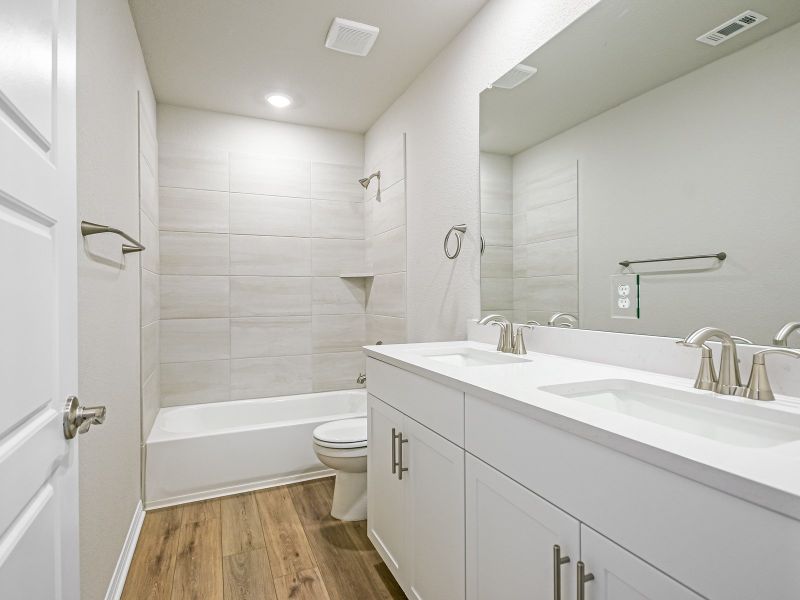 Furnished interior view inside a new home in Butler Farms - Boulevard Collection, Liberty Hill (Image 5).