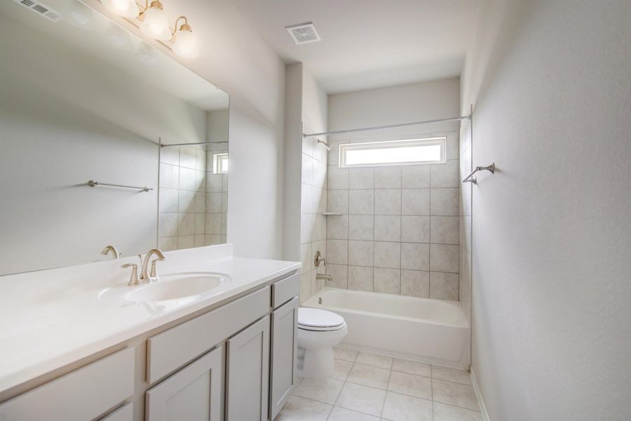 Representative furnished interior of a home built from the Floor Plan 2922 by Colina Homes in Grand Magnolia, Magnolia (Image 14).