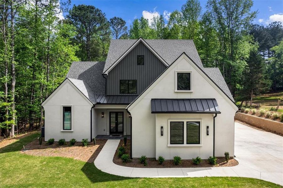 Front exterior of a new home in , Hoschton, GA, highlighting curb appeal (Image 26). Front exterior of a new home in , Hoschton, GA, highlighting curb appeal (Image 26).