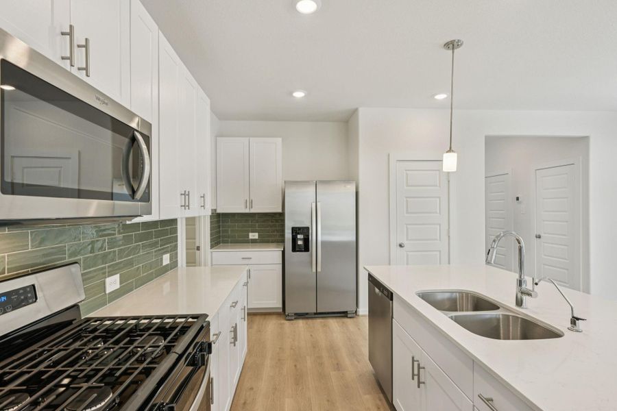 Furnished interior view inside a new home in Pine Lake Cove - Traditional Series, Montgomery (Image 6).