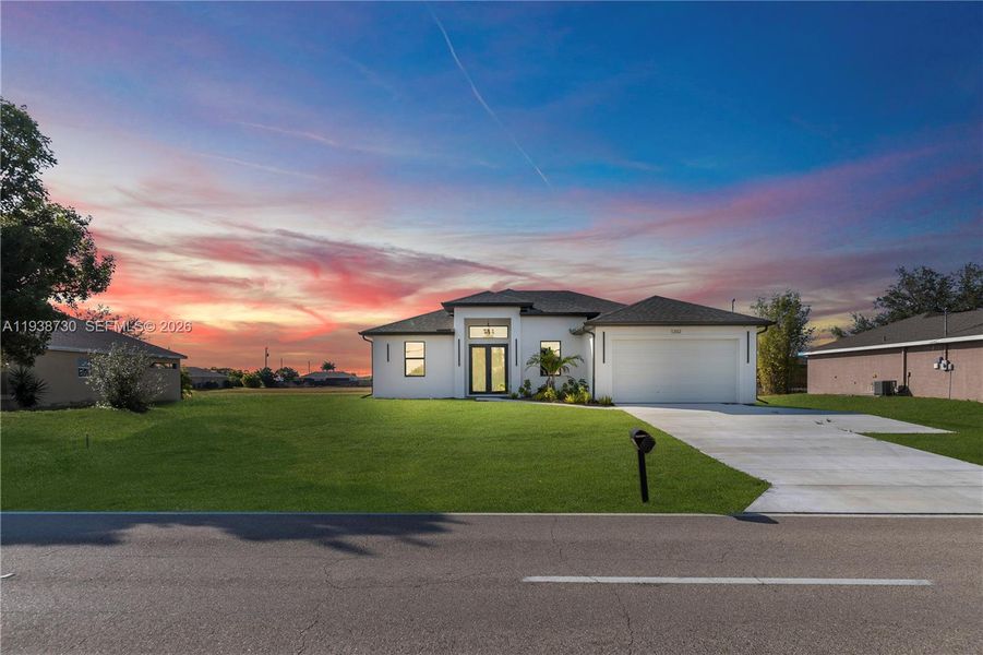 Front exterior of a new home in , Cape Coral, FL, highlighting curb appeal (Image 28).