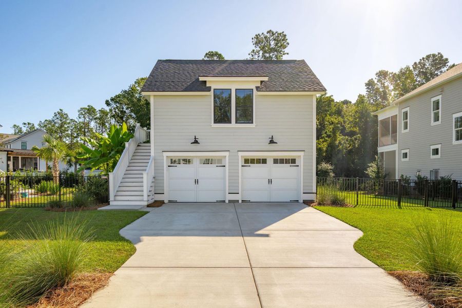 Front exterior of a new home in , Mount Pleasant, SC, highlighting curb appeal (Image 20).