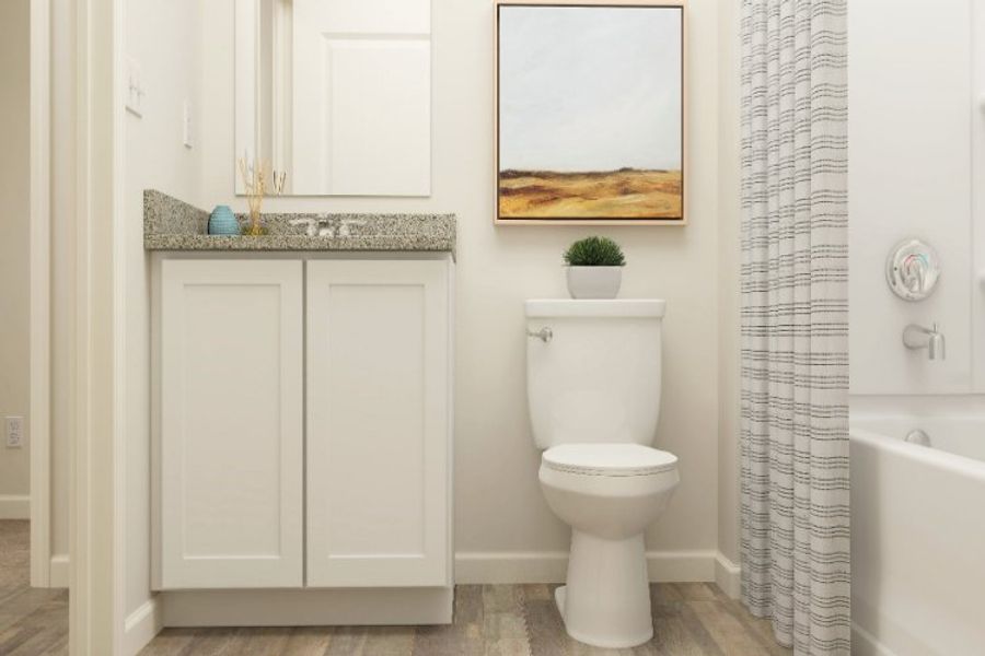 A bathroom with a toilet and a bathtub. A bathroom with a toilet and a bathtub.