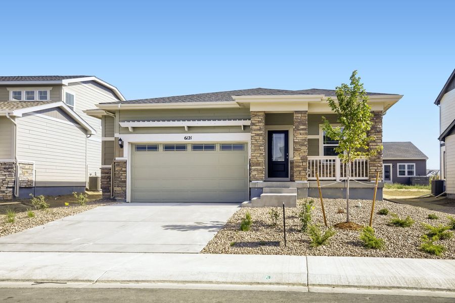 Front exterior of a new home in Kinston, Loveland, CO, highlighting curb appeal (Image 1). Front exterior of a new home in Kinston, Loveland, CO, highlighting curb appeal (Image 1).
