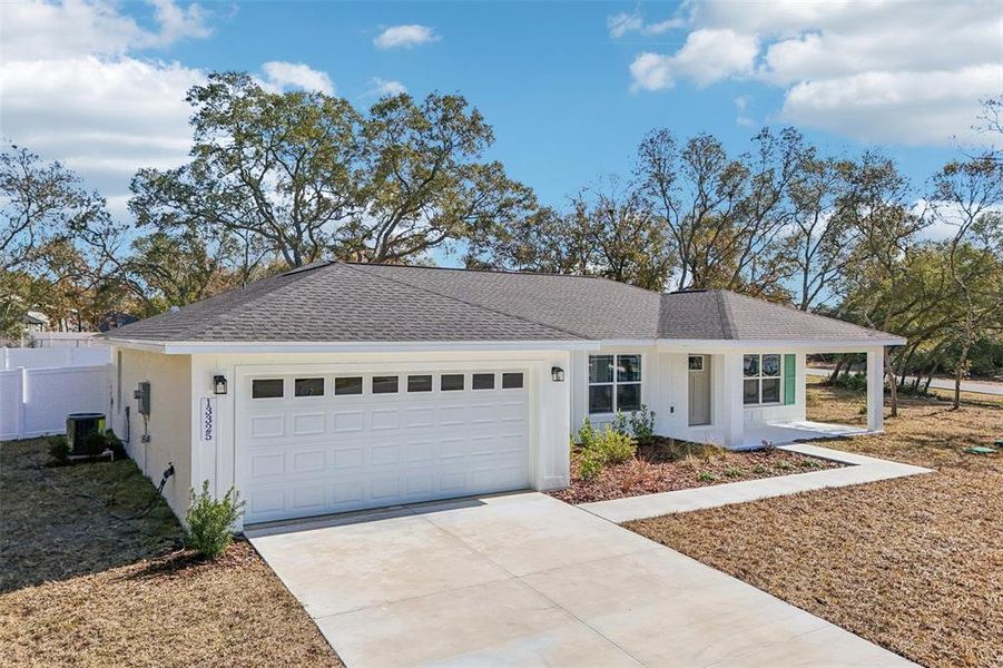 Front exterior of a new home in , Ocala, FL, highlighting curb appeal (Image 28). Front exterior of a new home in , Ocala, FL, highlighting curb appeal (Image 28).