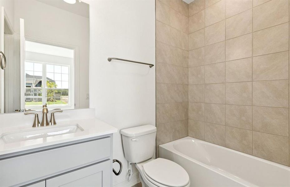 Upgraded secondary bath with elegant finishes