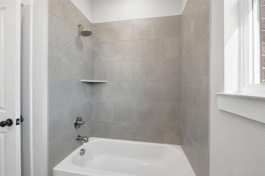 Bathroom with shower / washtub combination Bathroom with shower / washtub combination