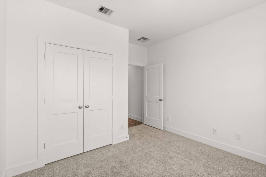 Spacious, unfurnished interior of a new home in Meridiana, Manvel (Image 16).